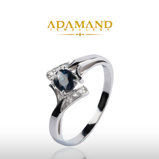 Бял златен пръстен с сапфир 0,25ct и диаманти 0,06ct