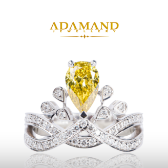 Бял златен пръстен с жълт бриллиант 0,99ct и 0,60ct диаманти